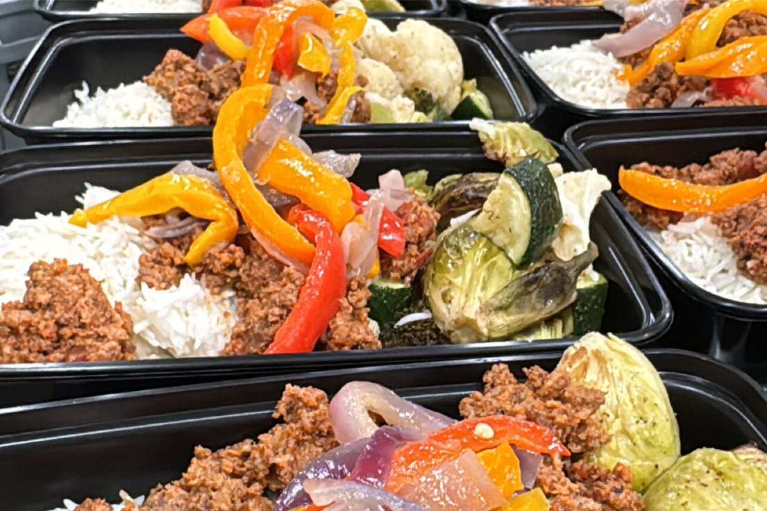 Colorful meal prep with peppers, onions, and fresh ingredients